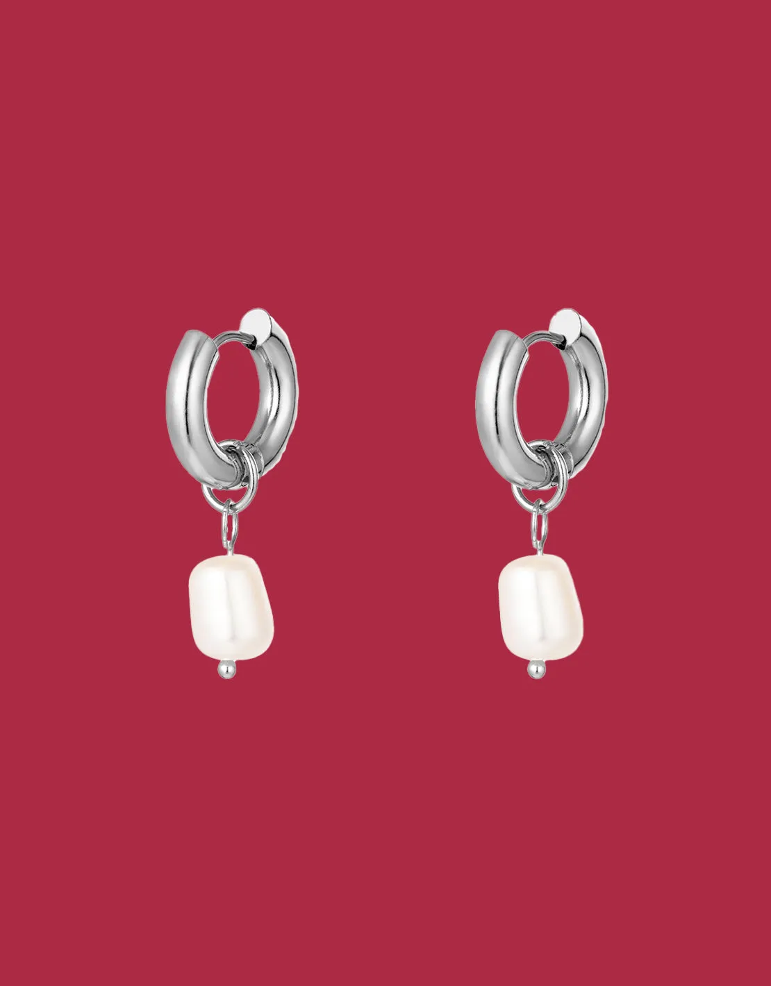 Dangling pearl earrings