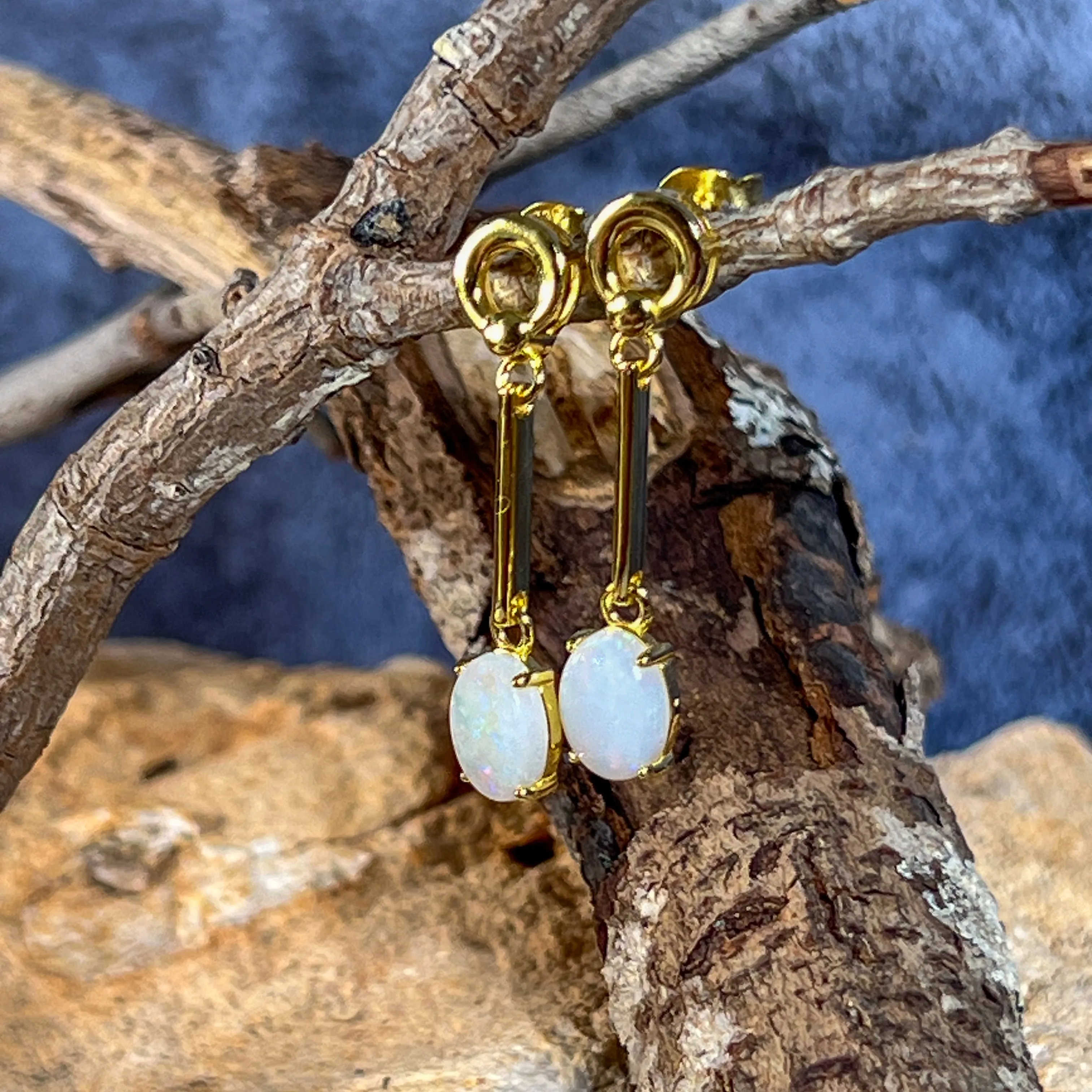 Gold plated silver White Opal earrings dangling claw set 8x6mm