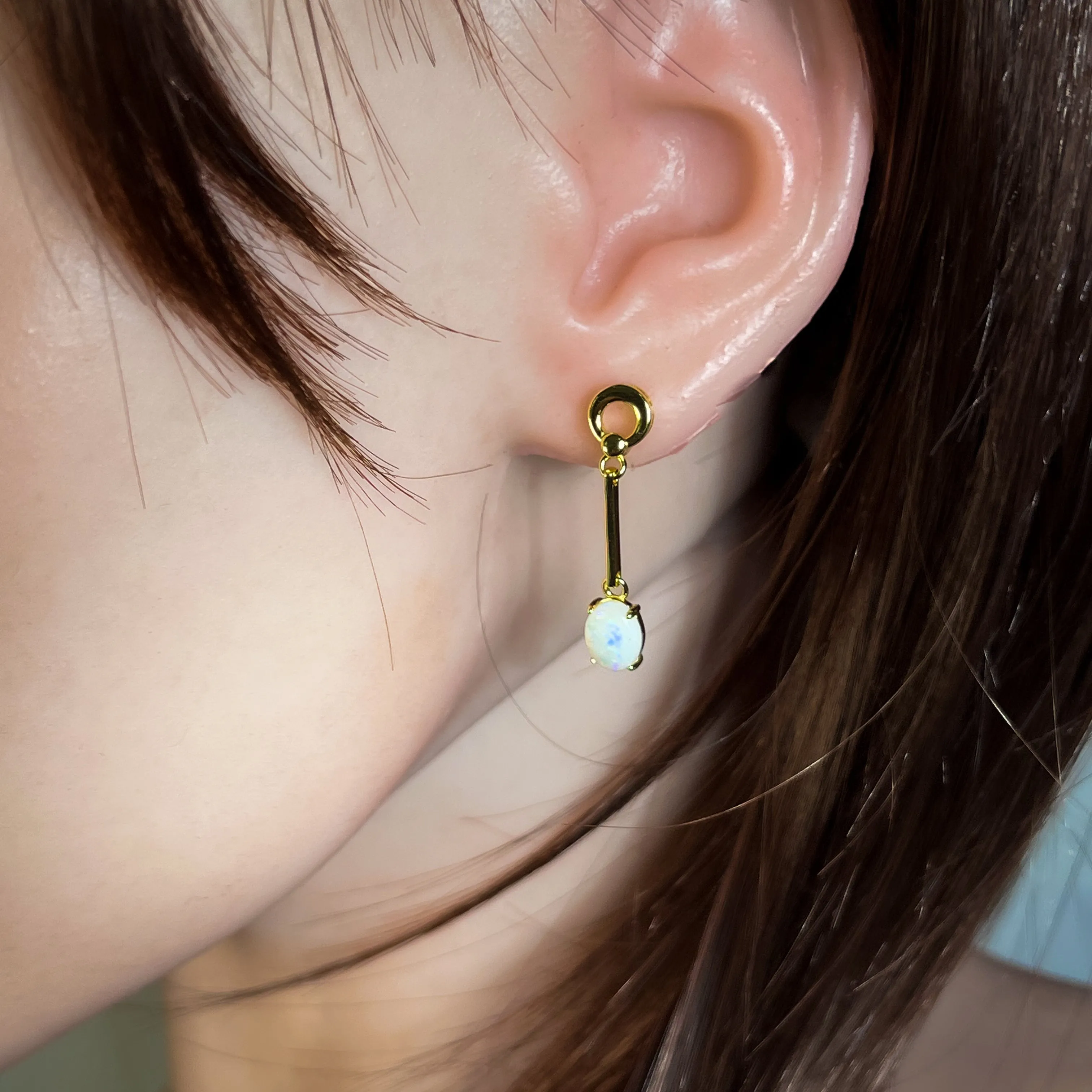 Gold plated silver White Opal earrings dangling claw set 8x6mm
