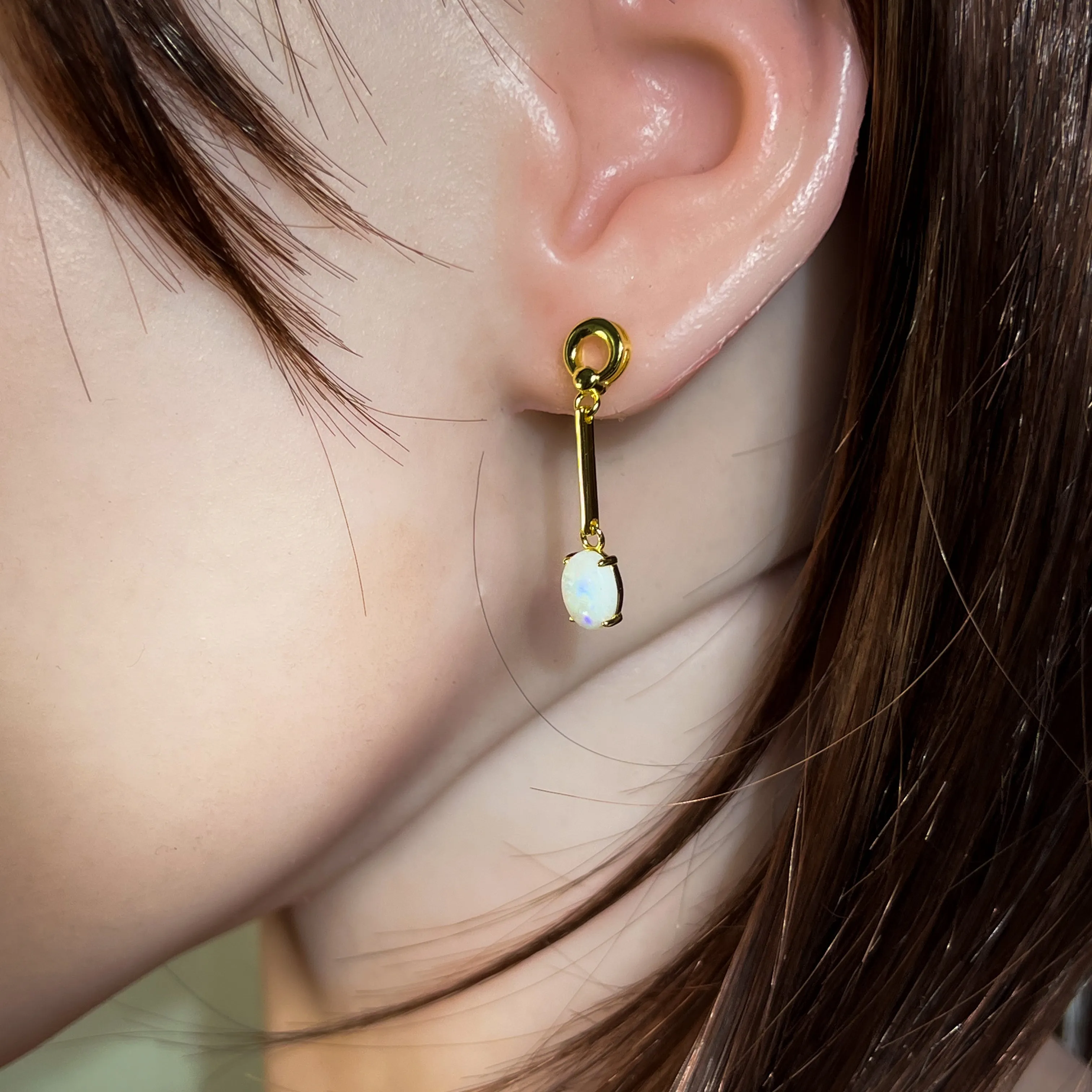 Gold plated silver White Opal earrings dangling claw set 8x6mm