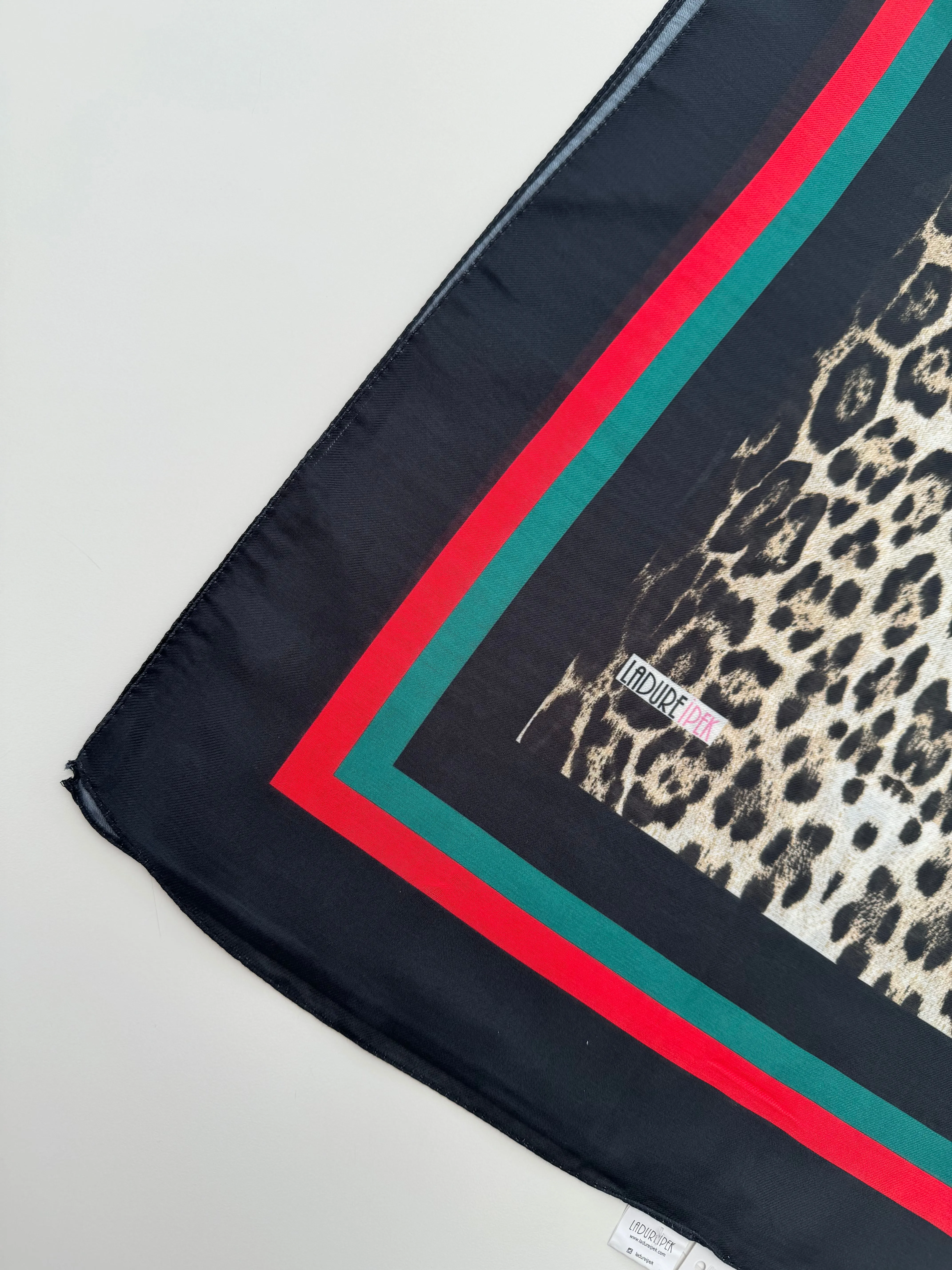 Leopard with Green & Red Line