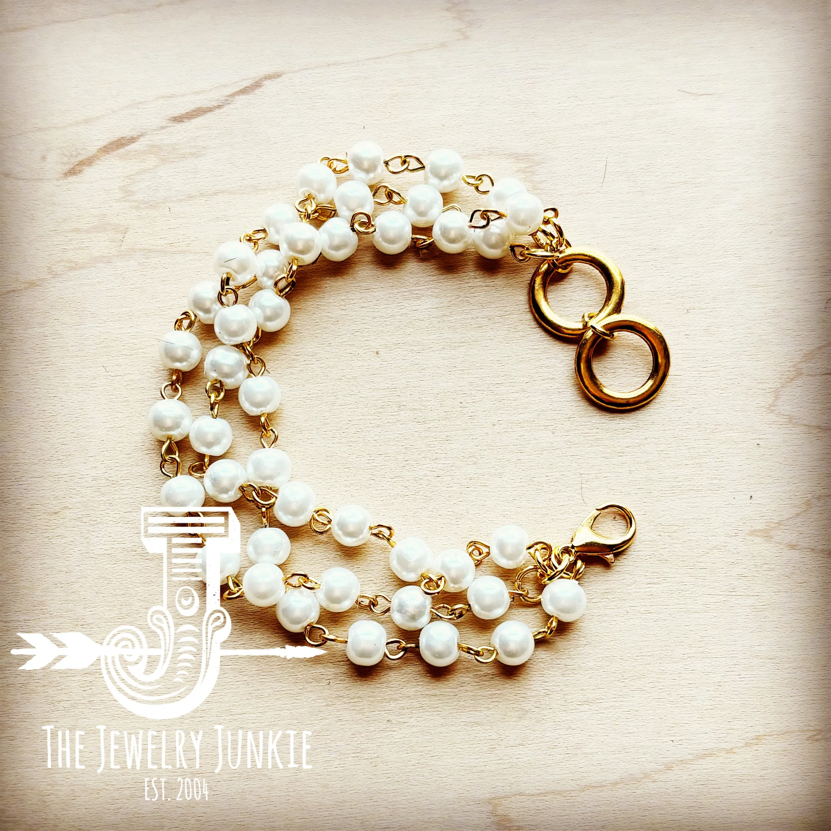 **Pearl Triple Strand Bracelet in Gold 808j