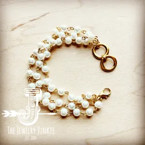 **Pearl Triple Strand Bracelet in Gold 808j